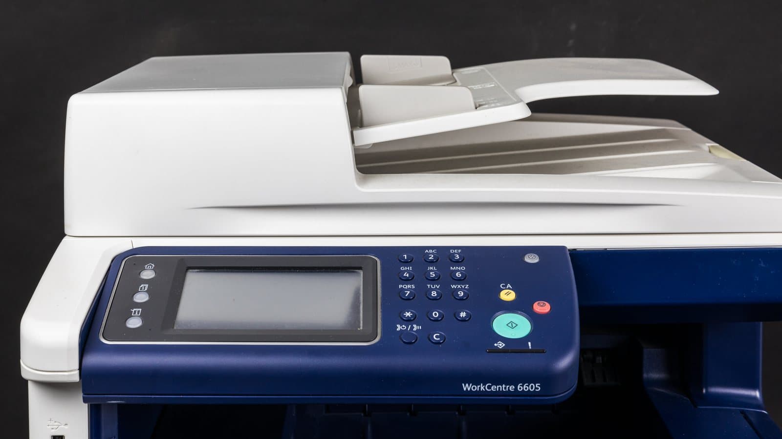 A Xerox WorkCentre multifunction production machine with its document feeder loaded.